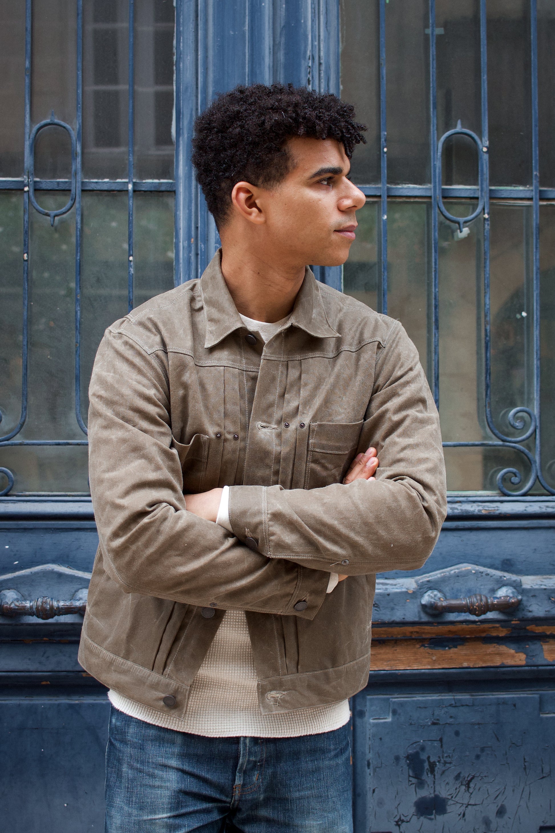 Lionel is wearing the RJ1 waxed jacket from FREENOTE CLOTH, made in USA with a Japanese fabric lining. Built to last